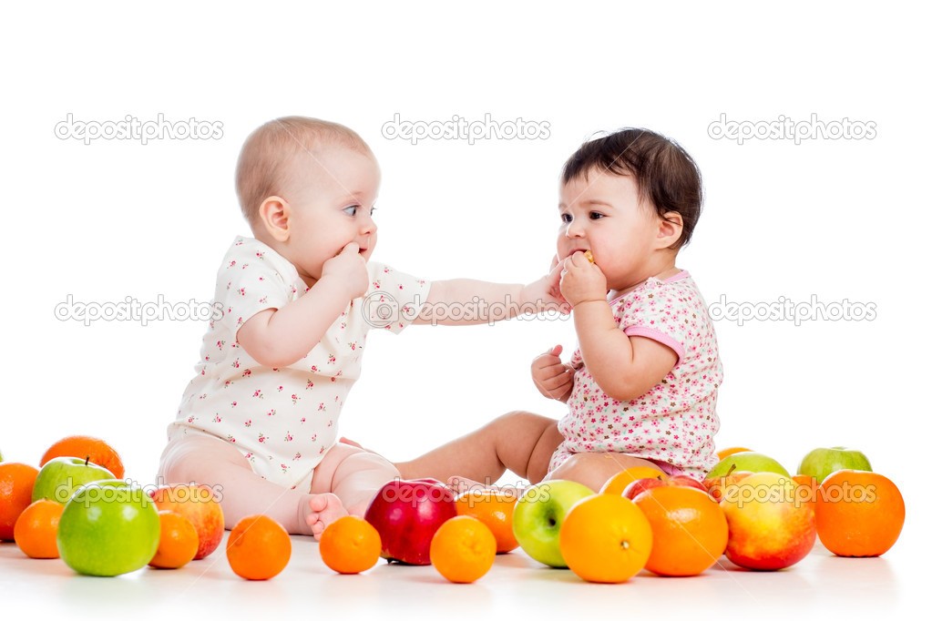 depositphotos 20240417 Funny children babies with healthy food fruits isolated on white
